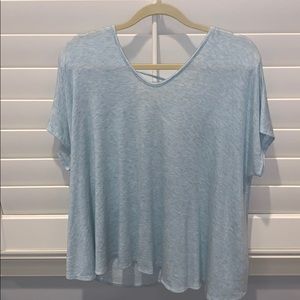 Light teal open back short sleeve shirt